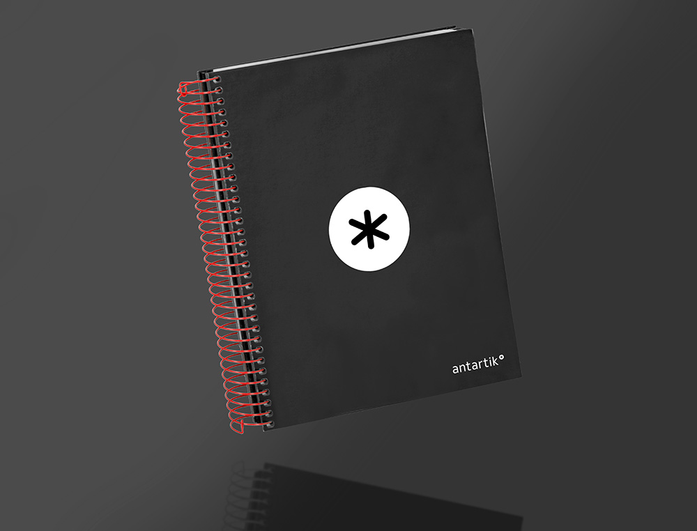 CUADERNO ESPIRAL A5 MICRO ANTARTIK TAPA FORRADA 120H 90G LISO CON BANDAS 6 TALADROS COLOR NEGRO